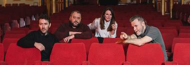 Group in theatre seats